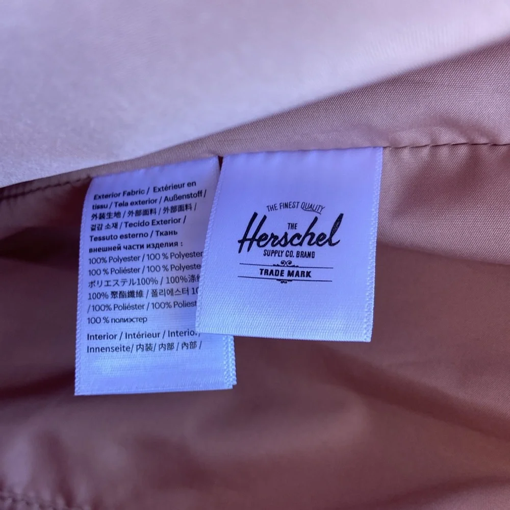 Herschel Supply Co. rose colored‎ canvas tote bag.